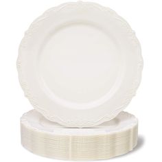 two white plates stacked on top of each other