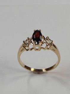 Solid 14kt Yellow Gold Ring Natural Garnet is 8x4 mm Marquise Cut Ring Size is 7 WITH GIFT BOX Marquise Cut Rings, Garnet Ring, Garnet Rings, Yellow Gold Ring, Marquise Cut, Yellow Gold Rings, Solitaire Ring, Gold Ring, Favorite Jewelry