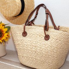 IN STOCK. SHIPPING FROM LOS ANGELES. FAST PROCESSING. An artisanal basket of hand-woven straw basket bag. Perfect for this summer! Shoulder or top handle carry. Color: Natural White Size: 50cm wide opening x 25cm tall (20in x 10in) Designer Style ID: 8359 Natural Braided Crochet Bag For Shopping, Palm Leaf Beach Bag With Braided Handles For Shopping, Rattan Beach Bag With Braided Handles For Shopping, Braided Straw Bag For Shopping, Braided Straw Shopping Bag, Summer Straw Bag With Natural Leather Handles, Natural Straw Bag With Leather Handles For Summer, Natural Straw Tote Bag With Braided Details, Vacation Beach Bag With Rattan And Leather Handles