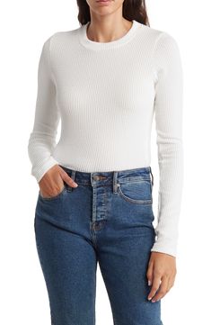 Refresh your essentials with this long-sleeve crop top cut from a stretchy ribbed knit. 18 1/2" length Crewneck Long sleeves 97% polyester, 3% spandex Machine wash, tumble dry Made in the USA Model stats: 5'10" height, 32" bust, 25" waist, 36" hip. Model is wearing size Small. Stretch Long Sleeve Cropped Sweater With Ribbed Neckline, Stretch Cropped Sweater With Ribbed Neckline And Long Sleeves, Stretch Ribbed Long Sleeve Cropped Sweater, Stretch Ribbed Cropped Sweater With Crew Neck, Fitted White Long Sleeve Ribbed Top, Fitted White Ribbed Long Sleeve Top, Fitted White Cropped Sweater With Ribbed Cuffs, Solid Ribbed Long Sleeve Top For Spring, Stretch Knit Cropped Sweater With Ribbed Detail