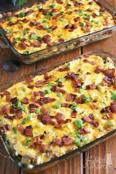 two casseroles with bacon and green onions in glass baking dishes on a wooden table