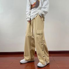 Threebooy Wide Leg Hip Hop Pants Button Decor Men Casual Cotton Harem Cargo Loose Baggy Trousers Streetwear Joggers Clothing Material: COTTON Applicable Scene: CASUAL Pant Style: Cargo Pants Style: Japan Style Model Number: MEN Thickness: midweight Waist Type: MID Casual Full Length Buttoned Pants, Casual Full Length Pants With Buttons, Casual Bottoms With Buttons For Streetwear, Casual Full Length Bottoms With Buttons, Casual Khaki Cargo Pants With Button Closure, Casual Khaki Pants With Buttons, Casual Khaki Button-up Bottoms, Casual Baggy Bottoms With Button Closure, Casual Wide Leg Pants With Snap Buttons