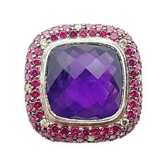 Amethyst 10.50 carats with Ruby 2.74 carats and Brown Diamond 0.24 carats Ring set in 18 Karat White Gold Settings Width: 2.3 cm Length: 2.3 cm Ring Size: 51 Total Weight: 14.89 grams "We first opened doors in 1980 when it was then situated in the vicinity of the Victory Monument; a small and modest storefront with a couple of counters. From its humble beginnings to where it stands today, our company has proven its abilities as a jeweler. Since the beginning, we have been supplying fine quality pieces to dealers, wholesalers and customers worldwide. From then till now, our business still interrelates its name with quality products and excellent service, where commitment and sincerity toward customers will always be its motto." Brown Diamond Ring, Sparkling Jewelry, Diamond Ring Set, Contemporary Ring, Diamond Ring Settings, Amethyst Jewelry, Brown Diamond, Women Diamond, Pretty Rings