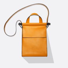 sunshine#color_sunshine Mini Handbag, Bungee Cord, Stained Wood, Montreal Canada, Mini Handbags, Staining Wood, Pebbled Leather, Bag Making, Montreal