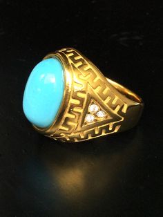 This is a very rare and perfect and unique magic ring made blue turquoise stone and silver gold plated, the power of the ring is to bring good luck and charm to the wearer. The ring showcases an elegant design with unique amulet style ring. It is great to get this ring for your loved one or treat yourself for a classic timeless style.  Ring US Size: 10,  Metal Type: silver gold plated,  Weight: 19.94 Gram (Approx.) The Belief about Blue Stone; 1. It's a very rare color. 2. It is the color of kin Gold Turquoise Ring For Formal Occasions, Formal Gold Turquoise Ring Fine Jewelry, Formal Gold Turquoise Ring, Fine Jewelry, Formal Gold Turquoise Ring In Fine Jewelry Style, Collectible Round Turquoise Ring, Gold Adjustable Turquoise Ring, Adjustable Gold Turquoise Ring, Adjustable Gold Spiritual Turquoise Ring, Adjustable Gold Turquoise Ring In Spiritual Style