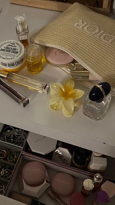 Im just a girl / girly things / makeup / aesthetic dior makeup bag / hawaii flower clip / flower clip / hawaii claw clip / flower clawclip / sol de janeiro / summer / perfume aesthetic/ rare beauty / dior aesthetic / olaplex / too faced bronzer /summer vibes / hawaii Dior Makeup Aesthetic, Aesthetic Makeup Bag, Dior Makeup Bag, Makeup Bag Aesthetic, Haut Routine, Expensive Makeup, Dior Girl, Dior Makeup