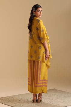 Yellow shirt kurta with floral print and sequin, bead embroidery. Paired with stripe print flared pant. - Aza Fashions Kurta Patterns, Printed Flare Pants, Yellow Shirt, Floral Print Shirt, Yellow Shirts, Embroidery Fabric, Bead Embroidery, Pant Set, Set For Women