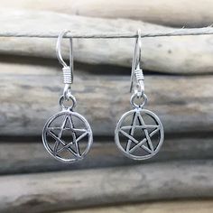 "925 Solid Sterling Silver Pentagram Earrings. These Earrings are 0.98\" (25mm) in length and 0.39\" (10mm) width. For more Pentagram Jewelry: http://etsy.me/2ASteYx For more Silver Earrings: http://etsy.me/2AJWHDP ENTER MY SHOP HERE: KalismaBijoux.etsy.com HANDMADE by ME - All my work is crafted with the utmost care in my studios - in Madrid, SPAIN CHANGES Don't hesitate to contact me if you have an idea or request. ABOUT MY PROCESS I am genuinely excited to make every piece. There aren't many Pentagram Earrings, Wiccan Earrings, Pentagram Jewelry, The Pentagram, Bali Earrings, Ancient Symbols, Spiritual Jewelry, Madrid Spain, Silver Hoop Earrings