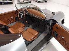 the interior of a classic car is clean and ready to be driven