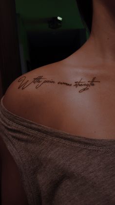 a woman with a tattoo on her shoulder that says, we are your own straight