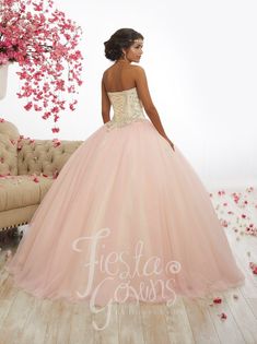 Light up the room in this long beaded strapless dress by House of Wu Fiesta Gowns Collection 56337. This beautiful ball gown features a sweetheart neckline, fully beaded with rhinestones, sequins on the strapless bodice, long A-line tulle skirt, and a lace-up back. House of Wu Fiesta Gowns Collection Spring 2018 Style Number: 56337 Fabric: Tulle/Beads Colors: Cream/Pink Sizes Available (as of 12/10/2024): 4, 6, 8, 10, 12 Occasion: Quinceañera, Sweet 16, Debutante Ball, Formal, Gala, Wedding, Red Pink Princess Quinceanera Dress With Fitted Bodice, Pink Quinceanera Dress With Sweetheart Neckline For Sweet 16, Pink Quinceanera Dress With Sweetheart Neckline For Debutante Ball, Strapless Pink Quinceanera Dress, Pink Ball Gown With Sweetheart Neckline For Quinceanera, Pink Strapless Ball Gown For Quinceanera, Pink Quinceanera Dress With Fitted Bodice For Debutante Ball, Strapless Pink Quinceanera Dress For Wedding, Pink Quinceanera Dress With Fitted Bodice For Sweet 16