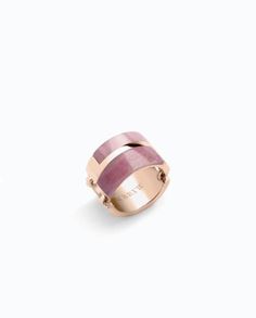 Basic with a twist. This sterling silver ring features smooth sterling silver with an onyx inlay and an opposing sterling silver chain, adding shape and dimension to everyday ring wear. Pink silver with Rose Quartz and Rhodonite Modern Enamel Open Ring With Polished Finish, Modern Polished Enamel Open Ring, Modern Polished Finish Open Enamel Ring, Modern Rose Gold Open Band Jewelry, Modern Rose Gold Sterling Silver Ring, Modernist Open Band Jewelry With Polished Finish, Modern Polished Enamel Ring, Acute Angle, Roller Chain