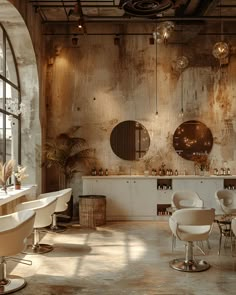 a room with chairs, tables and mirrors on the walls is shown in an industrial style