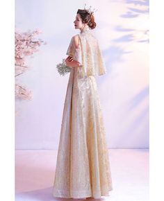 Buy luxury gold sequins formal pageant gown with collar jacket at wholesale price online. Free shipping and pro custom service since 2009. Gold Holiday Gown, Gold Dress With Cape Sleeves For Party, Gold Party Dress With Cape Sleeves, Gold Sequin Gown For The Holidays, Gold Sequined Gown For Holiday, Gold Holiday Gown With Sequins, Holiday Gold Gown With Sequins, Gold Sequin Holiday Gown, Formal Gown With Sequins And Cape Sleeves