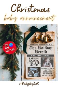 christmas baby announcement with bells and ribbon on the front, next to an old book