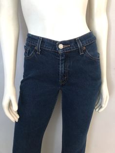 "Vintage Women's 90's Levi's 517, Jeans, Boot Cut, Low Rise, Denim (S) These 1990's Levi's 517 Jeans come in a darker blue wash and are low waisted with a zipper fly, boot cut leg with the signature red Levi's logo tab. 98% Cotton 2% Lycra/Spandex Made in Guatemala *These jeans are in excellent condition. *If shipped within the US, these will go Priority Mail for a quick delivery! Size: (S) Modern Day 4 (Tag Size: 7 Jr.M) Waist: 28\" Hips: 34\" Inseam: 30 1/2\" Rise: 12 1/2\" (back) 9\" (front) Levis 517, Boot Cut Denim, Womens Jeans, Low Waisted, Jeans Boot Cut, Quick Delivery, Guatemala, Priority Mail, Jeans And Boots