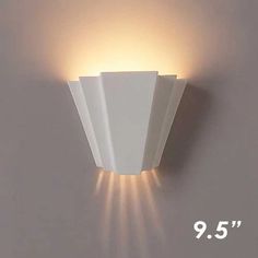 an image of a wall light that is on the side of a wall with white paper