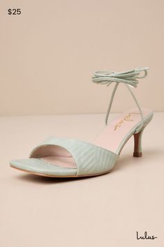 Instantly elevate any ensemble the moment you step into the Lulus Liddell Sage Green Textured Lace-Up High Heel Sandals! These stunning heels are composed of textured, embossed faux leather (highlighted with a gold metallic sheen) that shapes a square footbed and a wide, tapered toe strap. Slender straps sprout from the sides to wrap and tie above the ankle, all atop a sleek stiletto-style heel. 2. 75" wrapped stiletto heel. Lightly cushioned insole. Rubber sole has nonskid markings. Man made ma