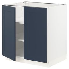 a white and blue cabinet with two doors on each side, one door open to reveal the other