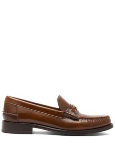 brown calf leather patent finish slip-on style moc stitching logo plaque almond toe branded insole flat sole Luxury Brown Calf Leather Tassel Loafers, Luxury Classic Calf Leather Tassel Loafers, Luxury Italian Craftsmanship Calf Leather Tassel Loafers, Classic Patent Leather Slip-on Loafers, Brown Luxury Loafers With Leather Footbed, Luxury Brown Loafers With Leather Footbed, Brown Patent Leather Slip-on Shoes, Brown Patent Leather Dress Shoes For Office, Classic Brown Slip-ons With Stitched Sole