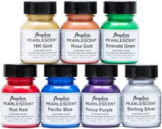 twelve different colors of acrylic paint