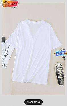 a white t - shirt and sneakers are laying on the floor