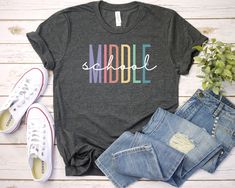 Middle School Teacher Shirt - Unisex T Shirt, Women Racerback Tank, Long Sleeve T-Shirt Tees Tshirt Sweatshirt Sweater Hoodie Gift For Men Women Boys Girls Well, let's say goodbye to all this boring apparel... The GodBlessThisDesign team creates custom clothes with great designs to suit all tastes. Our unique and blessed designs are a blast fit for every occasion and always a perfect fit... We combine our beautiful designs with high quality apparel like no one has ever done before. There's nothi Emergency Nursing, Nursing Shirts, Social Distancing, T Shirt Women, Gift For Men, Shirt Women, Racerback Tank, Custom Clothes, Long Sweatshirt