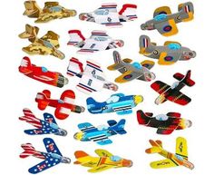 many different types of toy airplanes on a white background