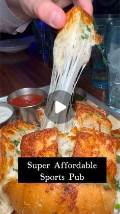 a person is eating some food on a plate with the words super afordable sports pub