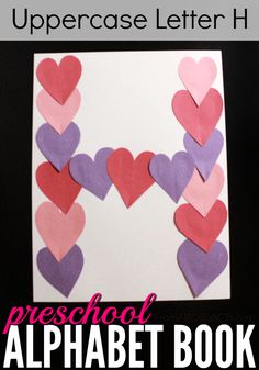 the uppercase letter h is made out of paper hearts