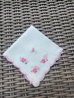 Offering a vintage, cotton handkerchief with a pink scalloped edge and  lovely embroidered floral  design in each corner.  The handkerchief measures 10" in square .   In excellent condition, freshly laundered, and pressed. $11.00 Spring Handkerchiefs With Floral Embroidery As Gift, Pink Handkerchiefs For Summer Gifts, Spring Gift Handkerchiefs With Floral Embroidery, Floral Embroidered Handkerchiefs For Spring Gift, Spring Floral Embroidery Handkerchiefs As Gift, Pink Spring Handkerchiefs For Gifts, Pink Cotton Handkerchiefs For Weddings, Flower Shaped Pink Handkerchiefs For Gifts, Pink Cotton Handkerchief For Spring