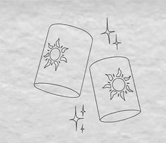 an image of two suns and stars drawn on paper