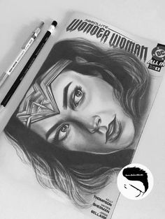 a pencil drawing of a woman's face with the word wonder woman on it