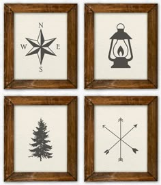 four framed pictures with different types of compasss and pine trees in wooden frames on the wall