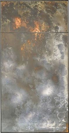 an abstract painting with silver and gold colors on the bottom half of it, overcast skies