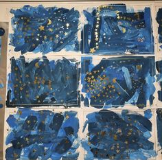 blue and gold art work with stars painted on the sides, in different stages of being made