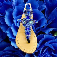 PLEASE NOTE THAT SIZES RUN SMALL! Recommend ordering one size up.  Pasha Jewelry for your feet - LICHADES. Embellished Royal Blue Rhinestone Ankle Chain Sandals. Flat Ankle Chain Sandals. 100% Supple Leather Sole. Handcrafted Accessories with finest Bohemian combination of Gemstones in Gold settings. 1.5cm (half inch) Heel. Inspired Handcrafted with Aegean sea inspired hues of Aquamarine and Capri Blue multifaceted stones. Metallic Blue leather straps with luxurious Suede comfortable underlining Blue Toe Post Sandals For Party, Blue Toe Post Party Sandals, Adjustable Closed Toe Party Sandals, Adjustable Open Toe T-strap Sandals For Party, Adjustable T-strap Open Toe Sandals For Party, Adjustable Flat T-strap Sandals For Party, Blue Barefoot Sandals For Summer Party, Blue Open Toe Barefoot Sandals For Party, Closed Toe Sandals For Beach Wedding