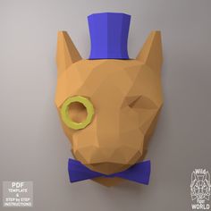 a paper sculpture of a horse wearing a blue hat and bow tie with a ring on it's nose