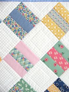 a close up of a patchwork quilt