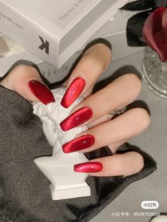 "All of my press-on nails are made with 4-6 coats of high-quality professional gel polish and gel, so rest assured, they are STURDY! They are also reusable! I am a qualified nail technician and all of my nail designs are hand-painted. I take great pride in creating nails that are of salon-quality. They are made with the highest quality, professional only products to ensure that they are perfect and look like you have just been to the salon! All of the products I use are vegan and cruelty-free! Yay! ✨ What's included with your order:  - Each nail set is delivered in a beautiful box, perfect for storing your nails or ideal to give as a gift  - 10 nails of your desired size, length and shape  - 24 adhesive tabs  - Nail glue  - Nail file  - Nail buffer  - Orange stick  - 2 Cleansing/alcohol wi Christmas Nails 2023 Red, Red Nails Cat Eye, Red Cat Eye Nails, Red Sparkle Nails, Cute Red Nails, Nails Cat Eye, Nail Polish Red, Lips Nails, Cruise Nails