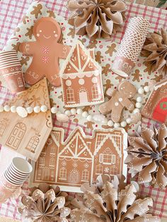 gingerbread cutouts and decorations on a table