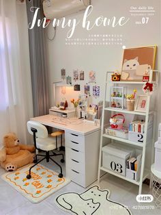 a child's bedroom with a desk and chair in front of the window is shown