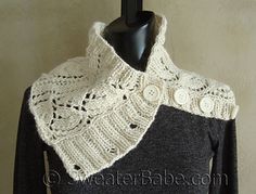 a black and white sweater with crocheted collar