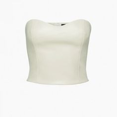 Ten By Babaton Cindy Bustier (Vegan Leather)(Birch) This Is A Strapless Bustier Top With A Sweetheart Neckline And Princess Seams For Shaping. It’s Made With Our Premium Stretch Vegan Leather From Japan, Crafted For Superior Shape Retention, Easy Care And An Authentic Look And Feel. Fit: Tight A Close Fit That Hugs The Body Length: Waist Intended To Hit Between The Waist And High Hip Bust 33 In Waist 25 In Materials & Care Origin: Fabric From Japan Content: 100% Polyurethane; Interior: 100% Nylo Elegant Crop Top With Boned Bodice, Chic Boned Bodice Tube Top, Elegant Bandeau Crop Top With Boned Bodice, Chic Cropped Tube Top With Boned Bodice, Chic White Top With Sweetheart Neckline, Chic Tube Top With Boned Bodice, Elegant Cream Crop Top, Chic Beige Corset For Night Out, Chic Cream Crop Top