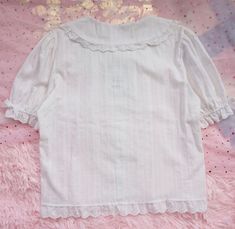 Details:Get it by Cost less than $18 only with 10% OFF New Season Deals Promo code: Corlus. 15% OFF any 2. Free Shipping $70. Free Exchange & Easy Returns. Thisj fashion white lolita blouse comes in peter pan collar . button down. crochet lace frilly sleeve. ruffle trim and comfy fit. Japanese Kawaii Sweet White Short Sleeve Lolita Blouseis a peter pan blouse in your beloved wardrobe. easily paired with shorts. jeans and leggings. Material:PolyesterColor: WhiteSize Details:Size S: Bust 100 cm. Shoulder 37 cm. Sleeve 23 cm. Length 55 cm;Size M: Bust 104 cm. Shoulder 38 cm. Sleeve 23 cm. Length 56 cm;Size L: Bust 108 cm. Shoulder 39 cm. Sleeve 24 cm. Length 57 cm;Size XL: Bust 112 cm. Shoulder 40 cm. Sleeve 25 cm. Length 58 cm;Design: Ruffled. Button Up. Loose. Oversized. Shirt. Short Sleeve Peter Pan Blouse, Blouses Women, Maxi Dresses Fall, Velvet Midi Dress, Fall Winter Dresses, Cowl Neck Dress, Japanese Kawaii, Lace Bow, Fashion White