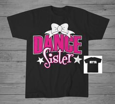 "Dance Sister T-Shirt with Bow. Product Details: Infant Bodysuit 100% Cotton. Infant Unisex T-Shirts 100% cotton ring spun combed. Toddler Unisex T-Shirts 60% cotton 40% polyester. Youth Unisex T-Shirts 60% cotton 40% polyester. How to Order: Select from Drop down menu -Shirt Color with Glitter Design or Without. -Size choice from drop down menu (SEE SIZE CHARTS IN IMAGES). Note in \"COMMENTS TO SELLER\" at checkout: -Personalization. -Color Changes (SEE COLOR CHARTS IN IMAGES). If name NOT prov Stretch Cotton T-shirt For Dance Class, Black Glitter Print T-shirt For Cheerleading, Black Cotton T-shirt With Glitter Print, Black Pre-shrunk T-shirt For Dance Class, Fitted Glitter Print Cotton T-shirt, Pink Cotton T-shirt For Dance, Cotton Cheerleading Top With Glitter Print, Ballet Shirts, Dance Comp