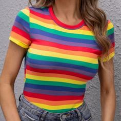 Make A Statement Without Making A Statement In This Bold And Beautiful Tee! Style: Casual Color: Multicolor Pattern Type: Rainbow Stripe Length: Regular Fit Type: Slim Fit Neckline: Round Neck Sleeve Length: Cap Sleeve Sleeve Type: Regular Sleeve Sheer: No Placket Type: Pullovers Body: Unlined Material: Polyester Composition: 95% Polyester, 5% Elastane Fabric: Slight Stretch Care Instructions: Machine Wash Or Professional Dry Clean Multicolor Stretch T-shirt For Summer, Fitted Multicolor T-shirt For Summer, Casual Multicolor Stretch T-shirt, Multicolor Stretch Casual T-shirt, Casual Stretch Multicolor T-shirt, Summer Multicolor Stretch T-shirt, Stretch Multicolor T-shirt For Summer, Colorful Crew Neck Tops For Spring, Rainbow Fitted Crew Neck Top