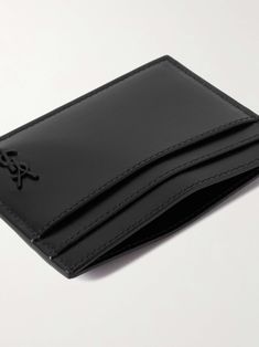 Shop SAINT LAURENT Cassandre Logo-Appliquéd Leather Cardholder, Explore the latest in-season SAINT LAURENT collection today on MR PORTER Saint Laurent Card Holder, Saint Laurent Collection, Leather Cardholder, Streamline Design, Streamlined Design, Leather Card Holder, Black Wallet, Card Holder Wallet, Card Holder Leather