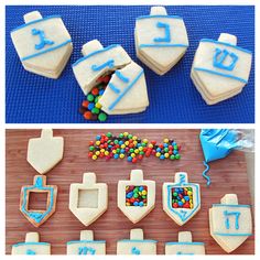 cookies decorated with blue icing and candy are displayed on a cutting board next to other cookie decorations