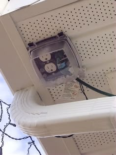 an electronic device is plugged into the side of a store's outlet box